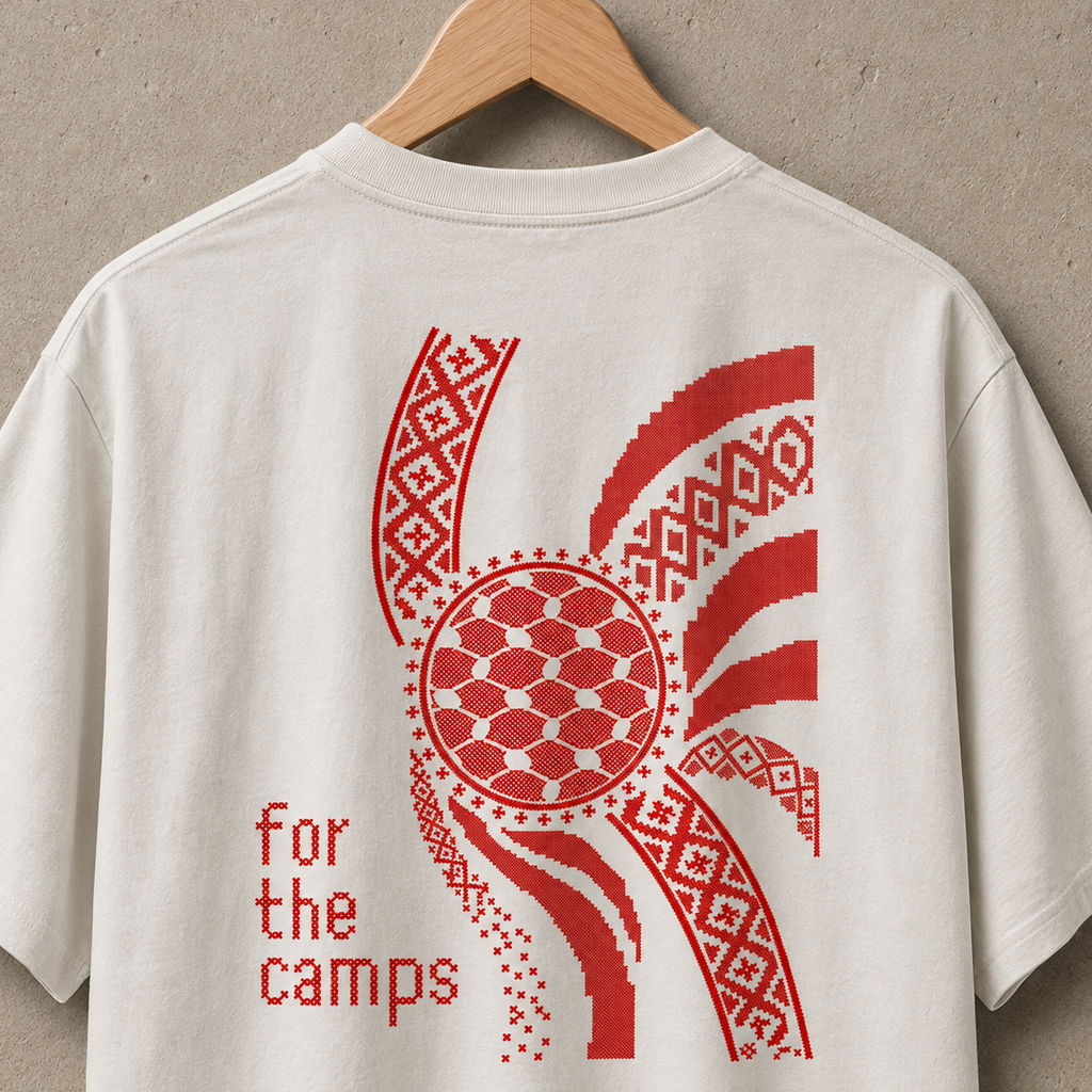 Close-up back view of Faded Bone heavyweight For the Camps Palestinian T-shirt with red tatreez-inspired artwork.