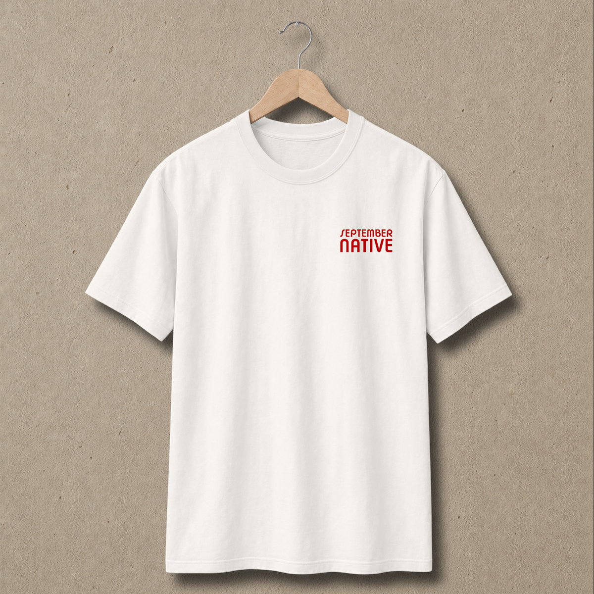 Front view of natural For the Camps Palestinian T-shirt with only a small red September Native chest logo.
