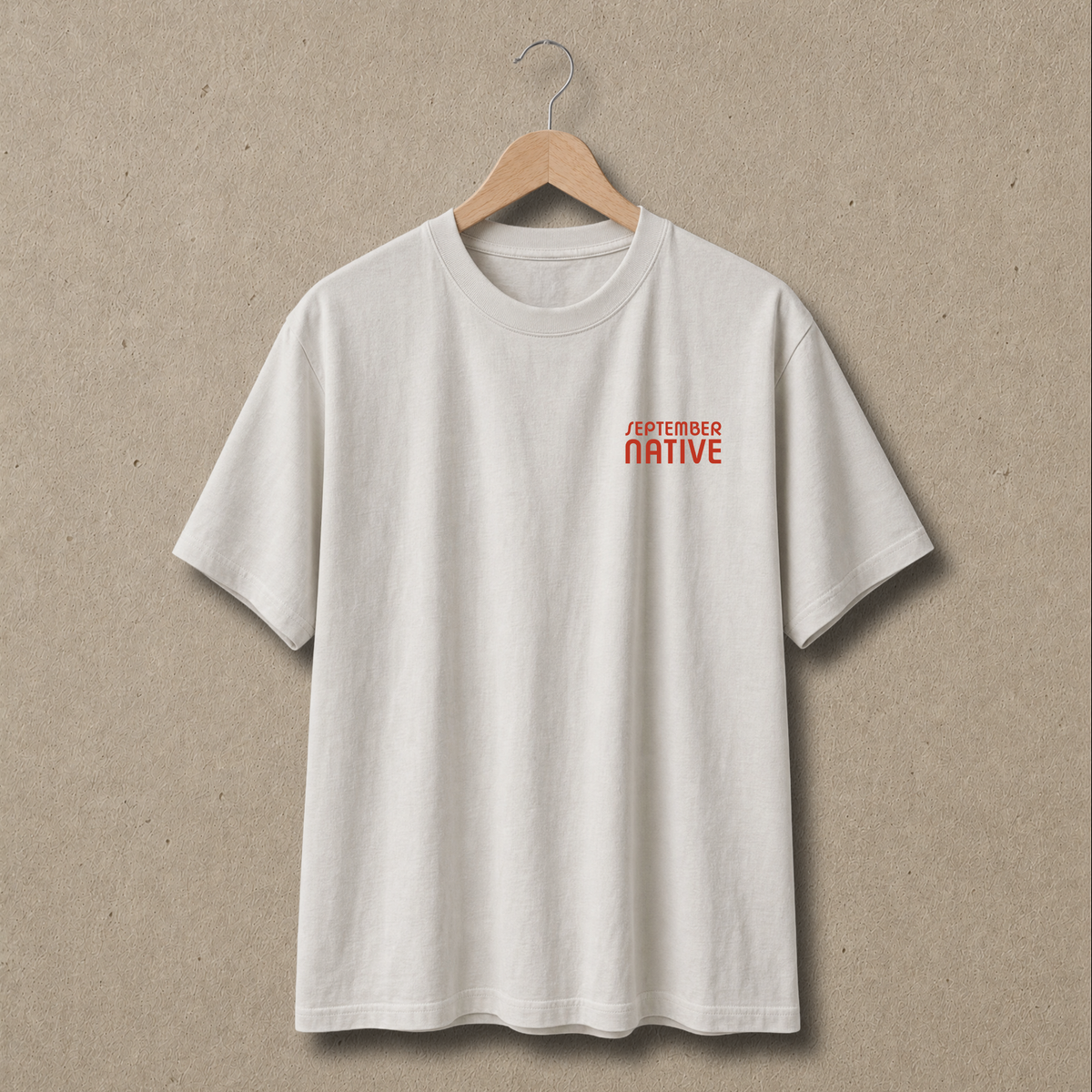 Front view of Faded Bone heavyweight Handala Palestinian T-shirt with only a small red September Native chest logo.
