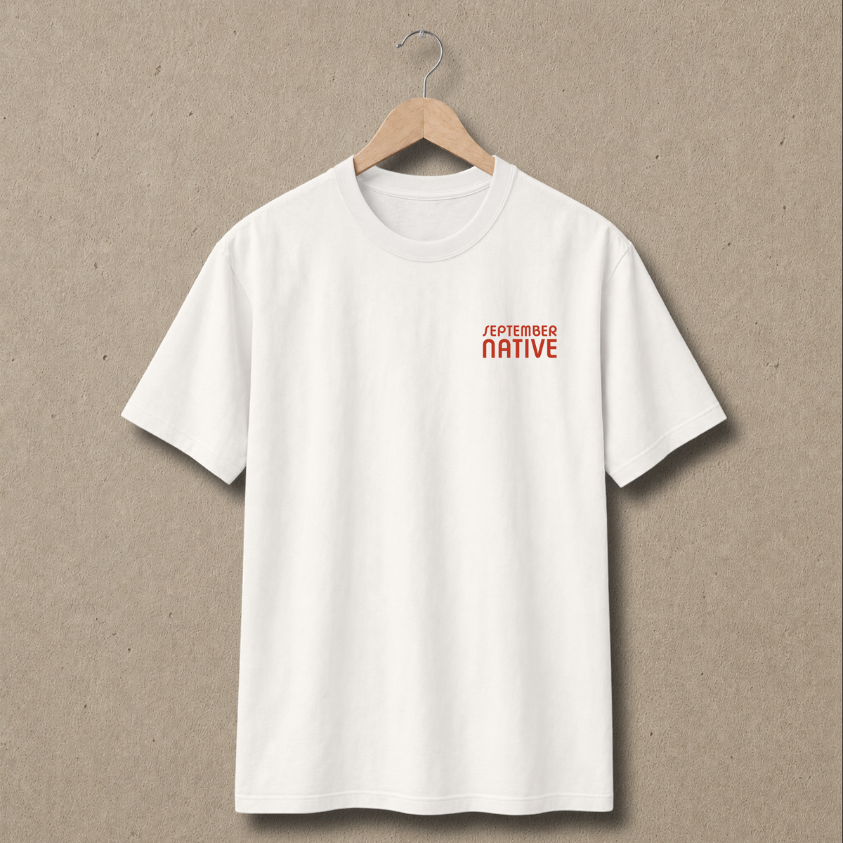 Front view of natural Handala Palestinian T-shirt with only a small red September Native chest logo.