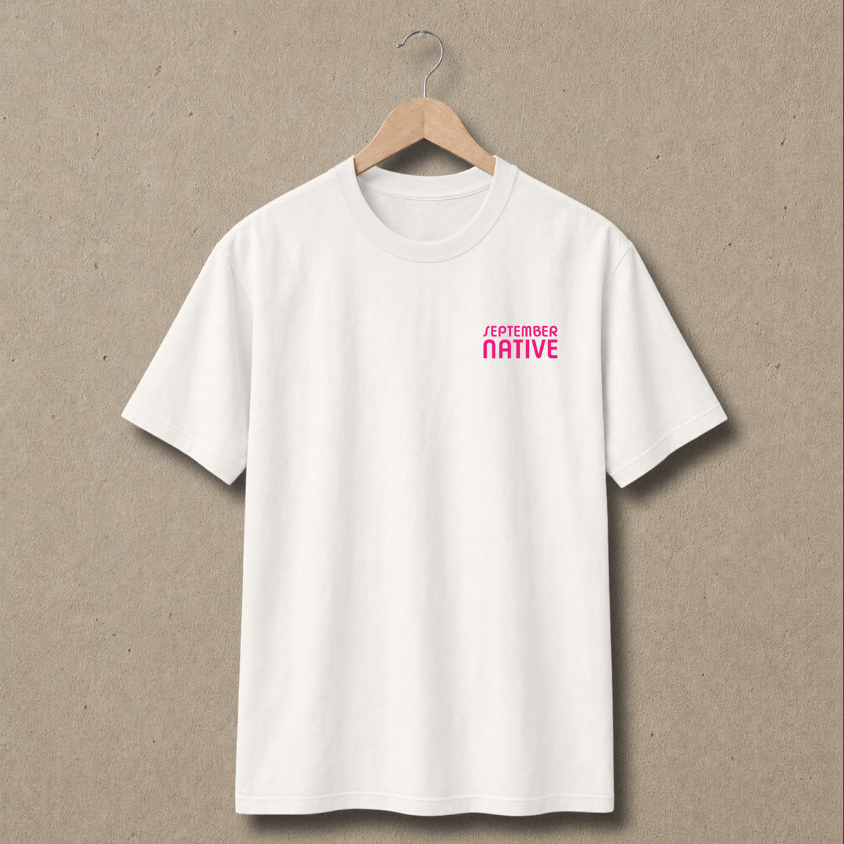 Front view of natural In Jerusalem Palestinian T-shirt with only a small pink September Native chest logo.