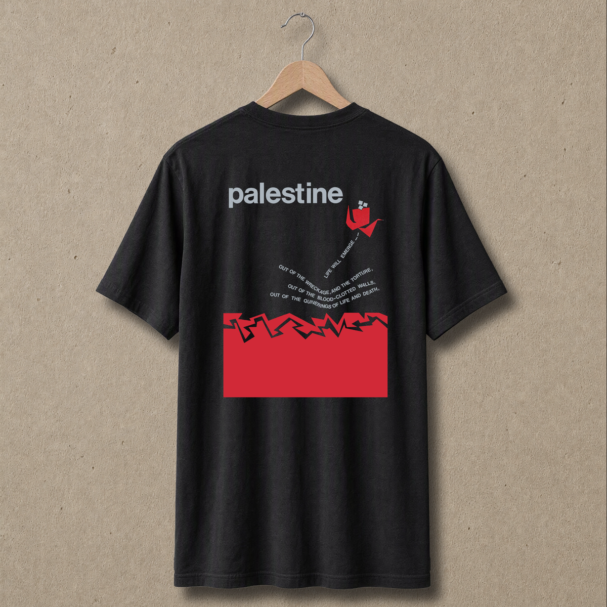 Back view of black Life Will Emerge Palestinian T-shirt featuring large grey “palestine” text, red graphic elements and the “Life Will Emerge” design.