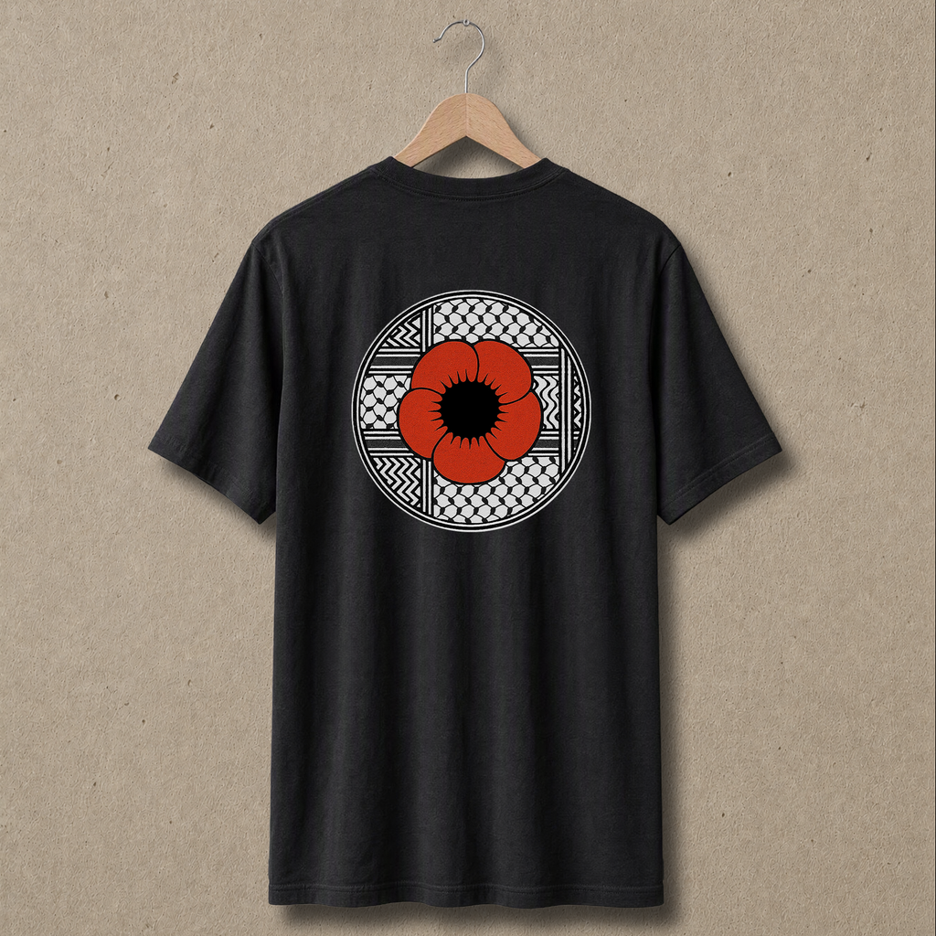 Back view of black Palestinian Poppy T-shirt featuring a large red poppy centered within a black-and-white keffiyeh-pattern circle.