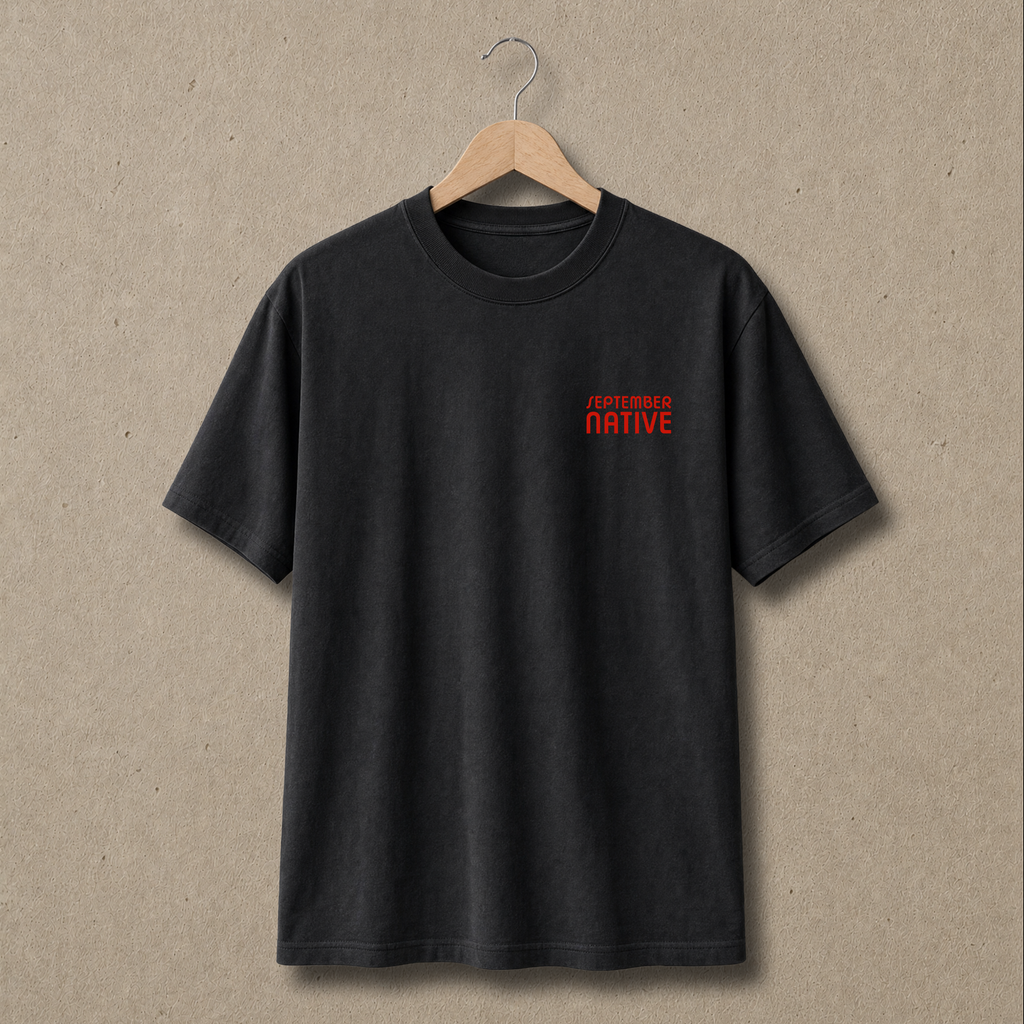 Front view of faded black heavyweight Poppy Palestinian T-shirt with small September Native chest logo.