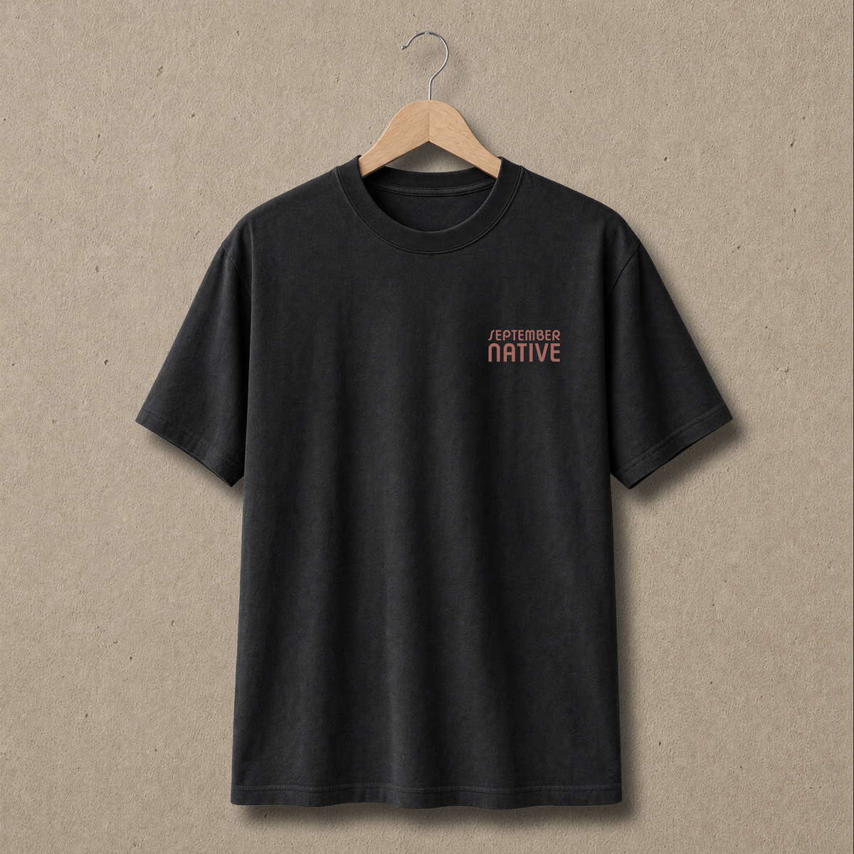 Front view of Faded Black heavyweight Sun Emblem Palestinian T-shirt with only a small red September Native chest logo.