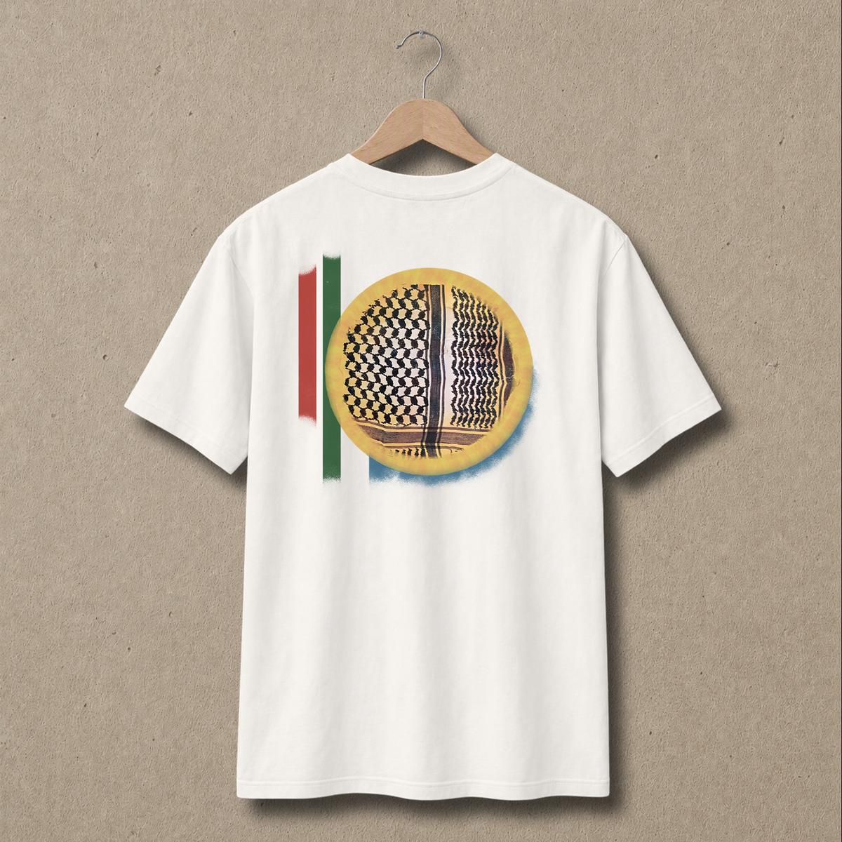 Back view of natural Sun Keffiyeh Palestinian T-shirt featuring a large keffiyeh-pattern sun graphic with red, green and blue vertical bands.